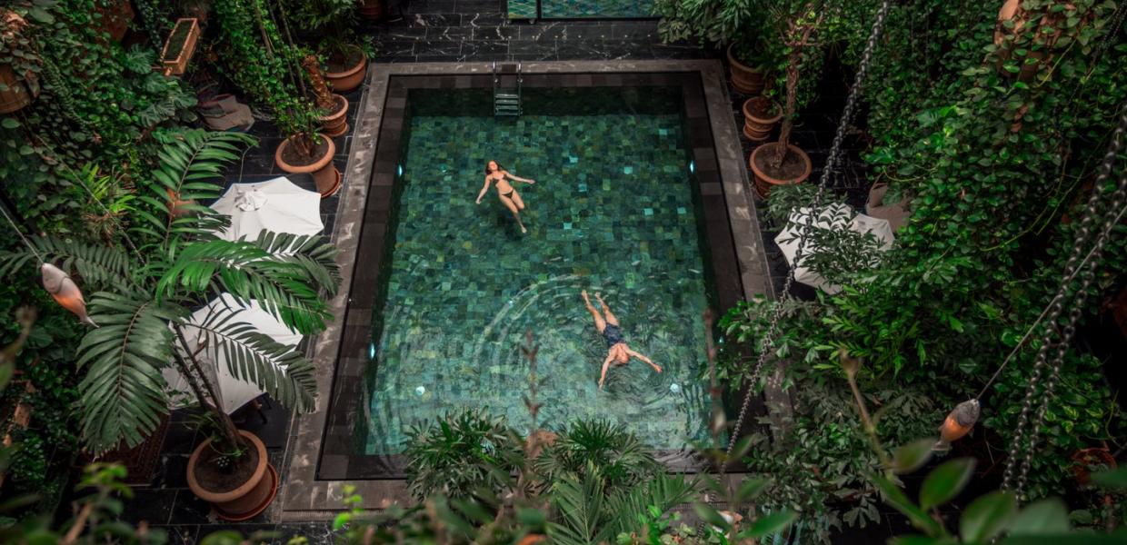 Girls enjoying a swimming pool at Manon les Suites 